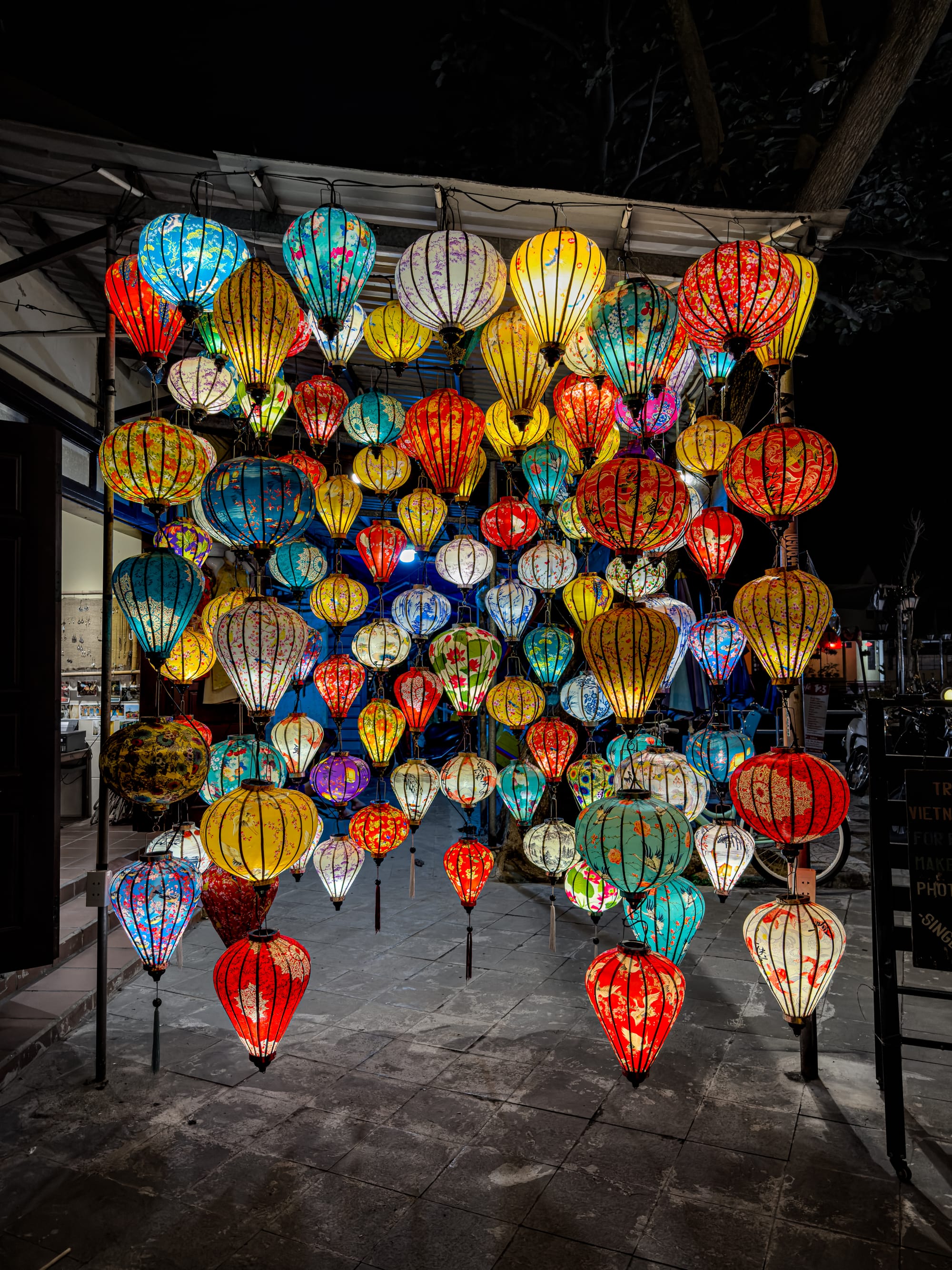 Colorful silk lanterns in Hội An’s Old Town, hanging in rows and glowing at night