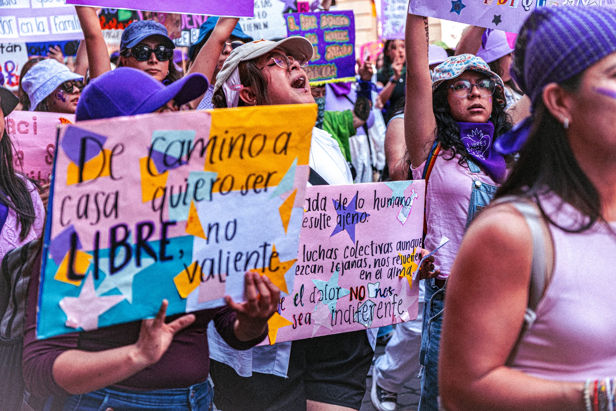 Feminist protesters with colorful handmade signs during the 8M march in Mexico City on International Women’s Day