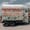 Hand-painted trailer at Dalton Brothers Ranch featuring cowboys on horseback set against Cappadocia’s distinctive rock formations, blending rustic charm with the region’s iconic landscape