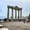 Visitors walk among the five remaining Corinthian columns of the Temple of Apollo in Side, Turkey